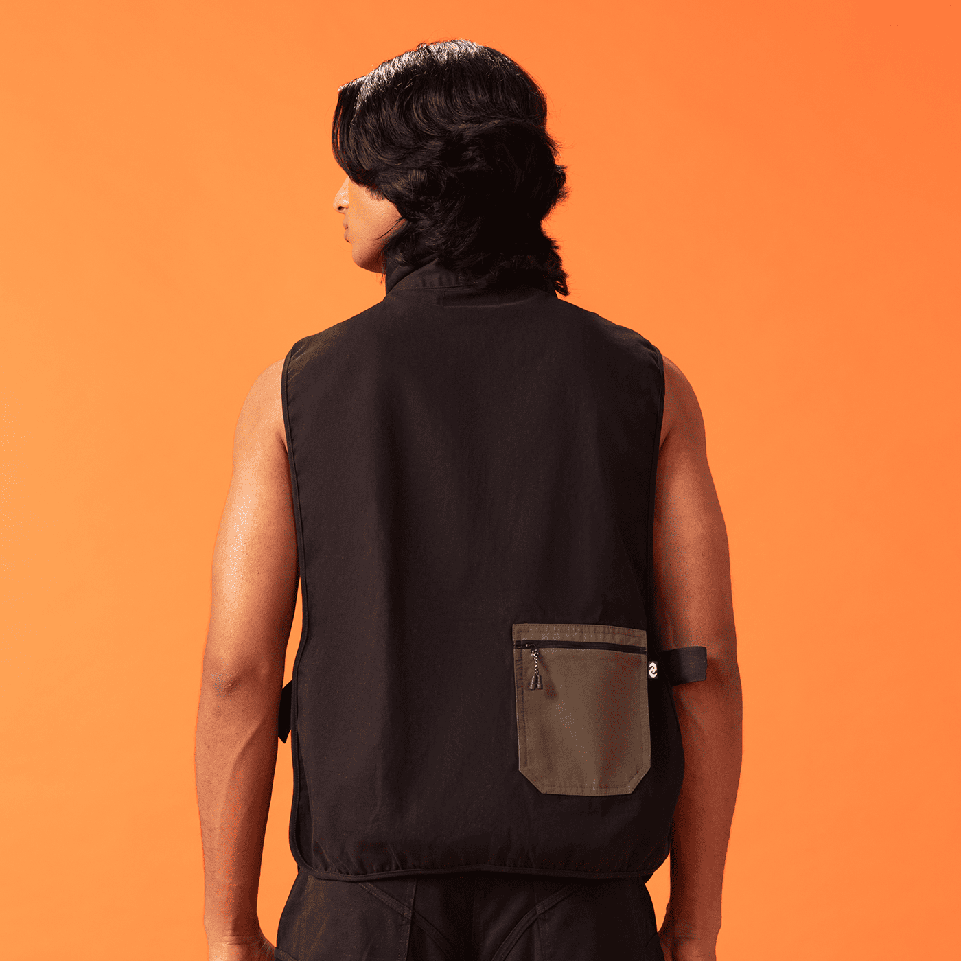 Model wearing Ozo 'Shuriken Utility' jacket, back view