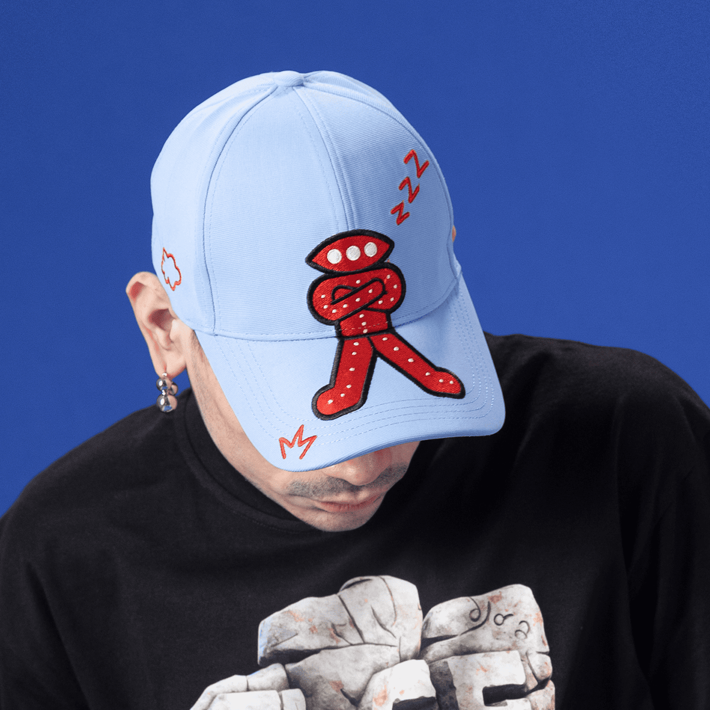 Model wearing Ozo 'Sage' cap, front view
